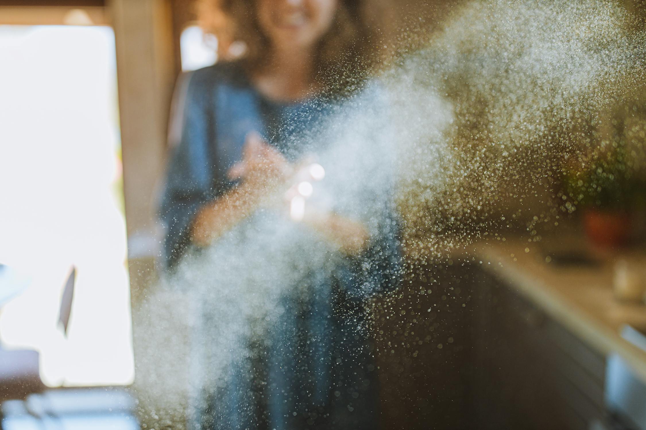 Spring pollen buildup on residential window glass needing cleaning